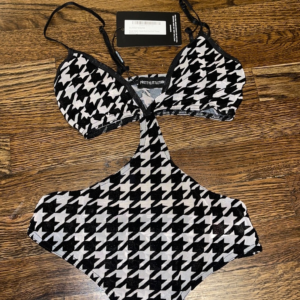 NEW black and white checkered cut out body suit